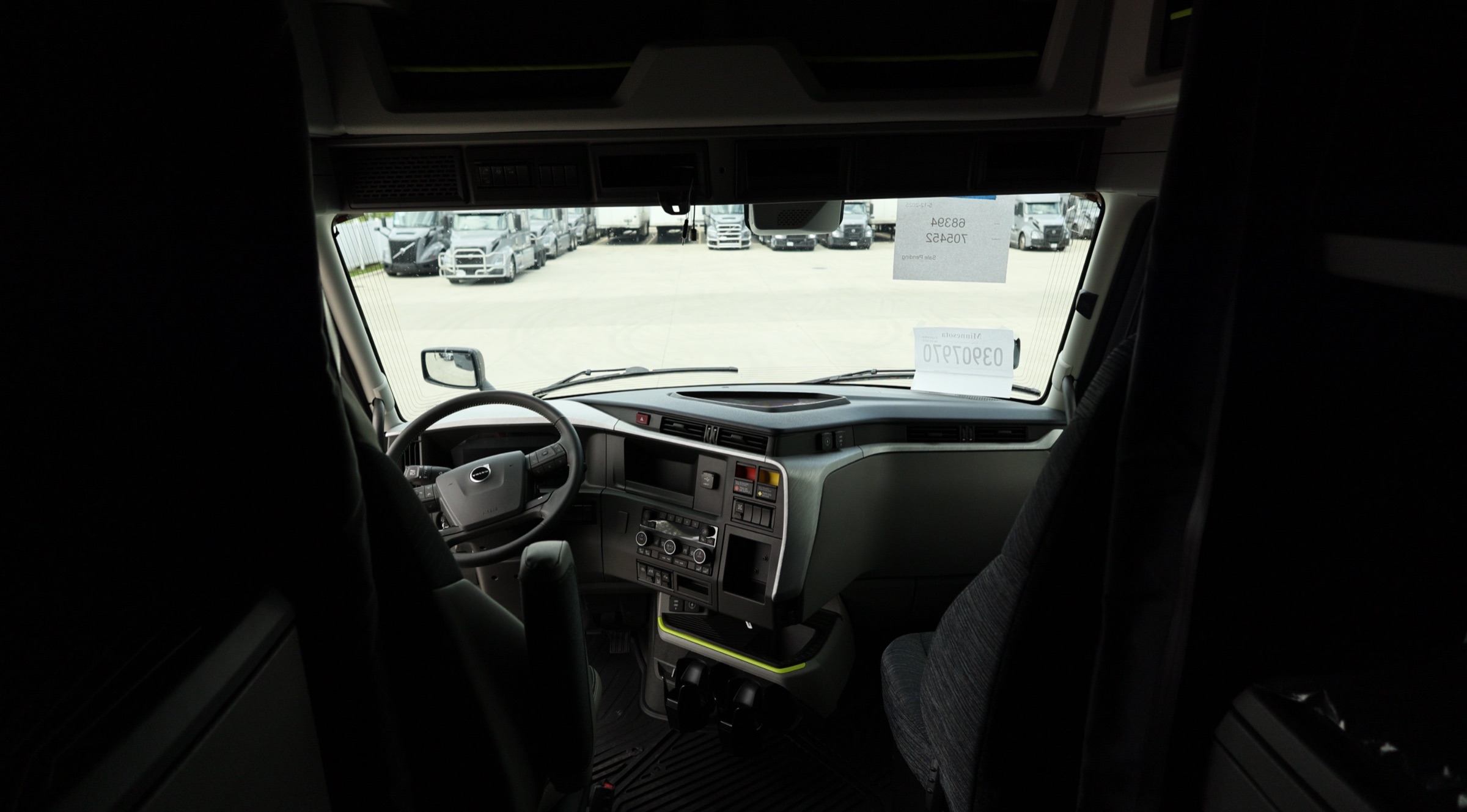 View from inside a new Volvo VNL over the yard