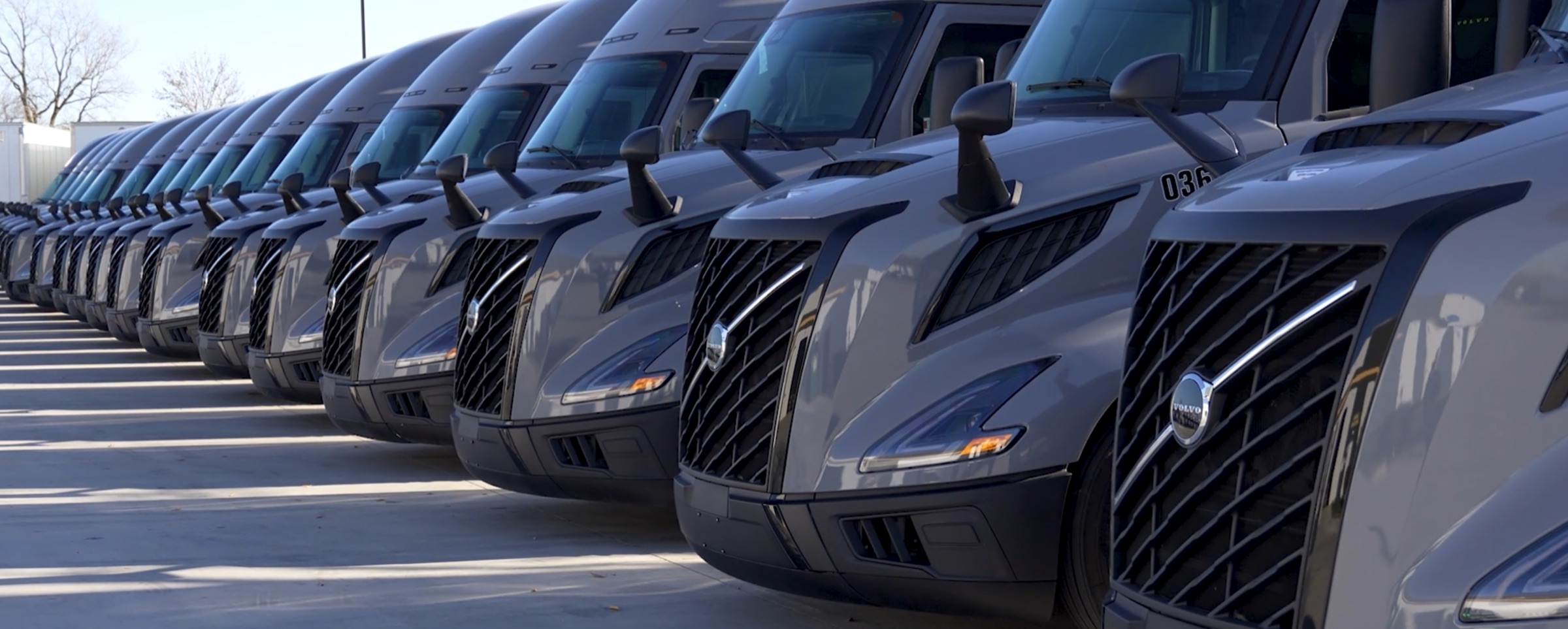 Close row of brand-new E&O Volvo VNL tractors